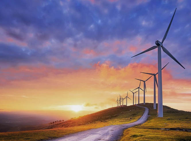 Windmills in front of sunset